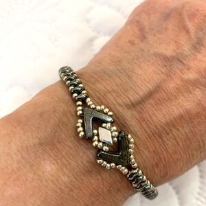 Hand crafted bracelet with Black, Blue/Grey and Silver Beads.